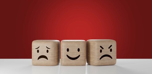 Wooden blocks hand flipping wooden with emoji icons isolated on a red background