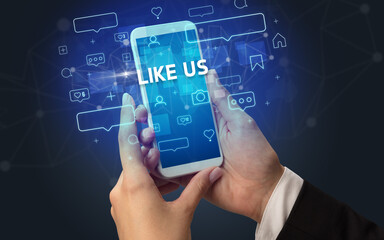 Hand using smartphone with social media concept