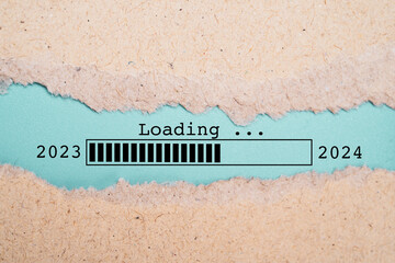 Loading 2023 to 2024 infographic technology inside of torn paper for countdown and start...