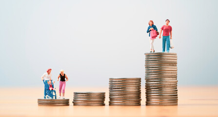 miniature figure parents standing in lowest coins and shopping couple woman and man standing in...