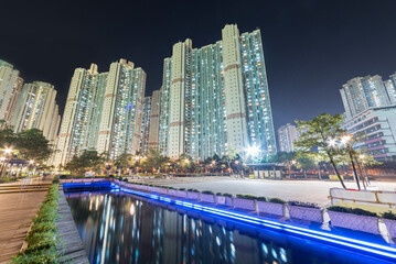 Fototapeta premium High rise residential building and public park in Hong Kong city at night