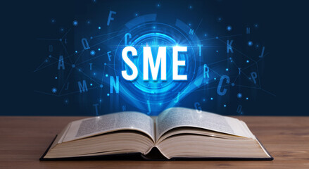 Technology abbreviation coming out from an open book
