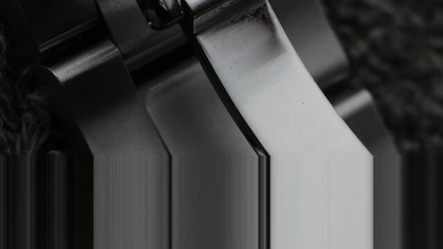 Macro close up of a steel metal professional watch strap in details 
Macro close up of a steel metal professional watch strap in details 
