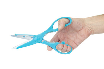 Blue scissors in hand close up on white background