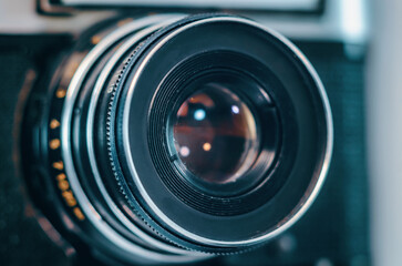 Old film camera lens close-up on lenses