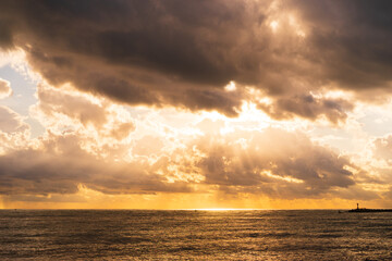 Sunrise over the sea and beautiful cloudscape. Nature landscape.