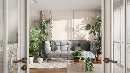 Classic white glass door opening on kitchen, dining and living room with sofa with many houseplants. Welcome home concept, urban jungle interior design idea