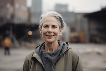 Portrait of a smiling senior woman in the city, outdoor shot
