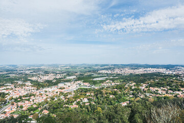 Aerial view of Sintra in Portugal. Old city seen from a distance. Landscape with buildings and woods