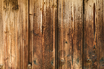 Wooden background. Old rustic rough wood. Old house wall. Vintage backdrop. Wood planks. Wooden texture background. Old surface