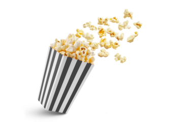 Popcorn flying out of black white striped paper box isolated on white, transparent background, PNG, with copy space. Splash, levitation of popcorn grains.