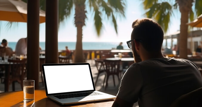 Young man using laptop with a cut out screen at sea resort. Remote work and business in palm paradise. Online purchase of air tickets and hotels. Copy space. Based on Generative AI