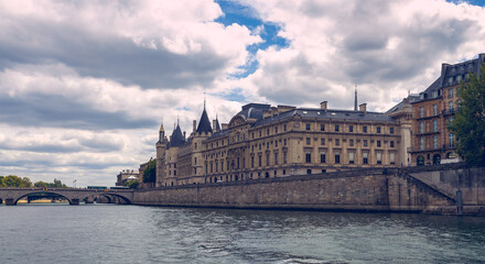 Fototapeta na wymiar Cityscape with Seine river in Paris, France, Europe. Toned image