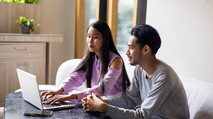 Asian mother and sick son listening consultation to psychologist doctor on online video call conference consult by laptop computer. Doctor online consultation and telehealth medicine