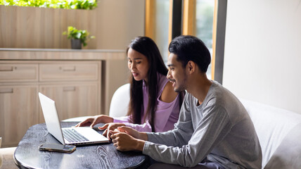 Asian mother and sick son listening consultation to psychologist doctor on online video call conference consult by laptop computer. Doctor online consultation and telehealth medicine