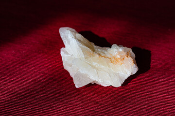 Quartz stone on a red background