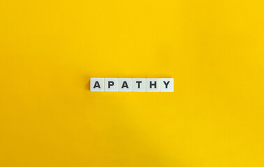 Apathy Word on Letter Tiles on Yellow Background. Minimal Aesthetics.