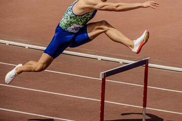 athlete runner running 400 metres hurdles is track and field hurdling event, summer athletics championships