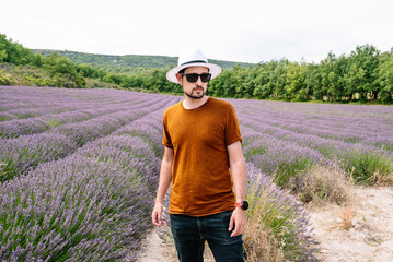 Man standing in a lavender field.