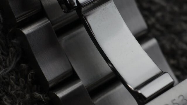 Macro close up of a steel metal professional watch strap in details 
Macro close up of a steel metal professional watch strap in details 
