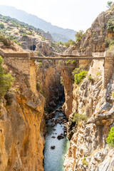 Views of the Caminito del Rey in Malaga, gorges, valleys, walkways, metal walkways, walking along a ferrata route during a sunny summer day