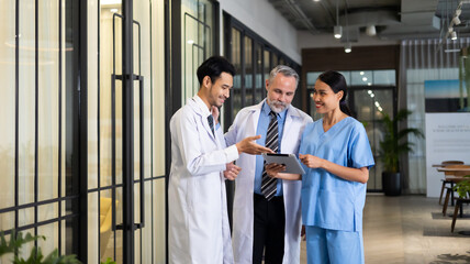 Professional medical staff people successful and teamwork concept. Diverse doctor and nurse walking...