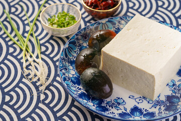 Preserved egg tofu on blue background