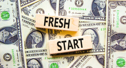 Fresh start and motivational symbol. Concept words Fresh start on beautiful wooden block. Beautiful...