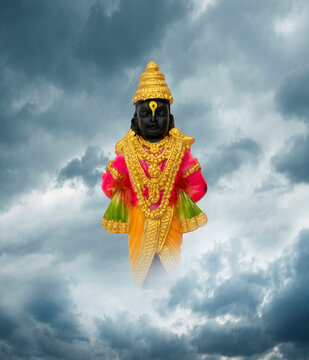 Lord Vitthal with cloud in the background, Ashadi Ekadashi festival of Lord Vitthal from Pandharpur Maharashtra India, Happy Ashadi Ekadashi