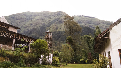 landscape of a mountain with a grassy house