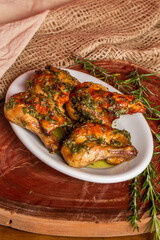 roasted chicken with herb sauce . In Brazil it is called a galeto.
