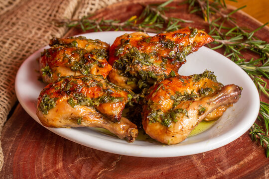 roasted chicken with herb sauce . In Brazil it is called a galeto.