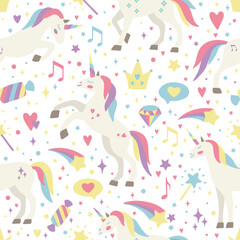 Fototapeta premium Seamless vector pattern with cute unicorns on a floral background. Ideal for textiles, wallpapers or prints.