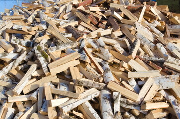 Pile of firewood, closeup photo of birch chocks