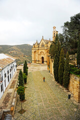 Fototapeta na wymiar Antequera: Saint Mary the Greater Collegiate Church (16th century) seen from the Alcazaba. Antequera is a town in the province of Malaga located in the heart of Andalusia, Spain