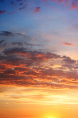 Naklejka na ściany i meble sunset sky with lighted clouds