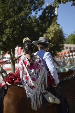 A couple dressed with the typical costumes of the world famous 'Feria de abril' of Seville,  Spain 