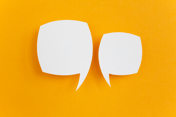 paper speech bubble on yellow background