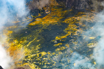 Closeup view of Mount Bromo's crater bottom with active lava flows and sulphur covered rock formations, Tengger Semeru National Park,  East Java, Indonesia.