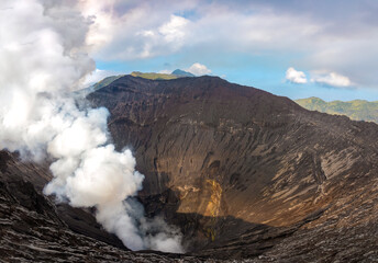 Dramatic view inside the crater and active caldera of Mount Bromo (Gunung Bromo) an active somma volcano, Bromo Tengger Semeru National Park,  East Java, Indonesia.