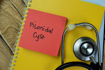 Concept of Pilonidal Cyst write on sticky notes with stethoscope isolated on Wooden Table.