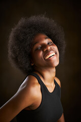 Happy ethnic young female with Afro hairstyle