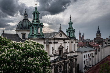 Church of St. Anne in flowers at dark and cloudy morning, Krakow, Poland