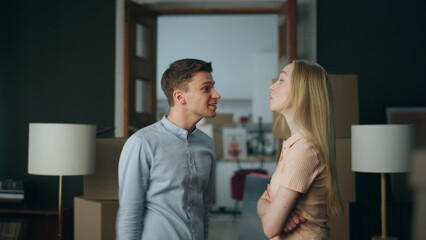 Boyfriend shouting stressed girlfriend emotionally in new house close up. 