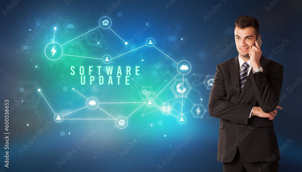 Wall mural Businessman thinking about technology concept