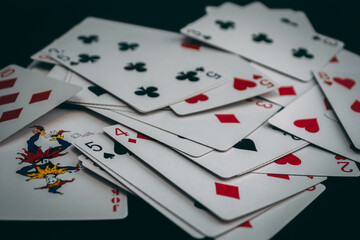 deck of cards on a black background, different combinations