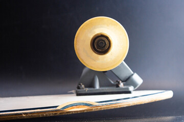 longboard close up, active sport, big wheels