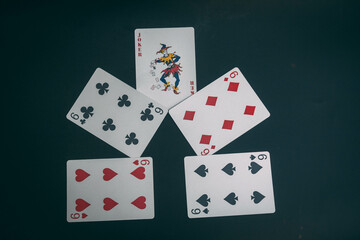 deck of cards on a black background, different combinations