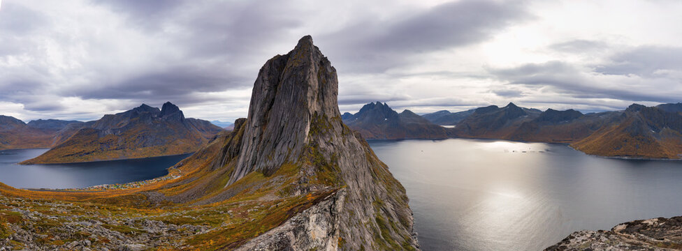 Panorama view from Mt Hesten towards Mt Segla surrounded by two beautiful fjords, Oyfjorden and Mefjorden, in Troms og Finnmark, Norway 