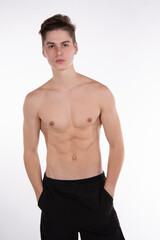 Fototapeta premium Young attractive guy posing in the studio. 